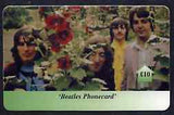 Telephone Card - Beatles £10 phone card #03 showing the 4 with Flowers