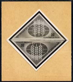 Guinea - Conakry 1963 Freedom From Hunger stamp sized photographic proof of rejected triangular design (pair joined and mounted on small card)